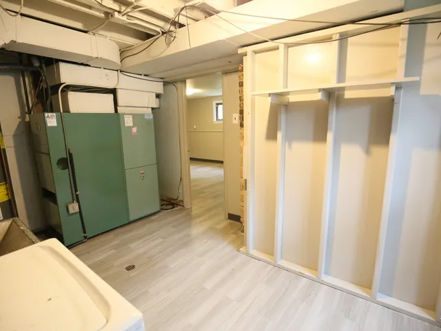 a view of a bathroom with a glass door shower and vanity