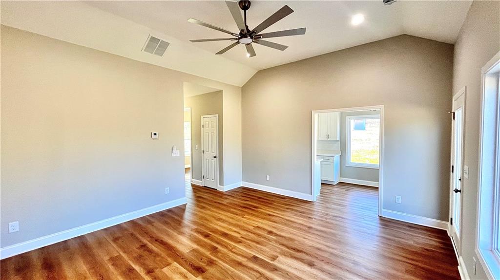 23 S Road Griffin, GA 30224 - Photo 6 of 32 a view of an empty room and window and wooden floor