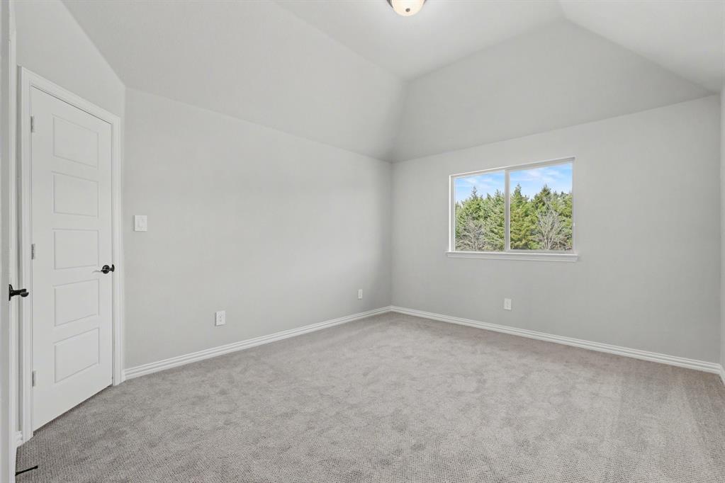 7041 Champion Road Midlothian, TX 76065 - Photo 25 of 30 an empty room with windows