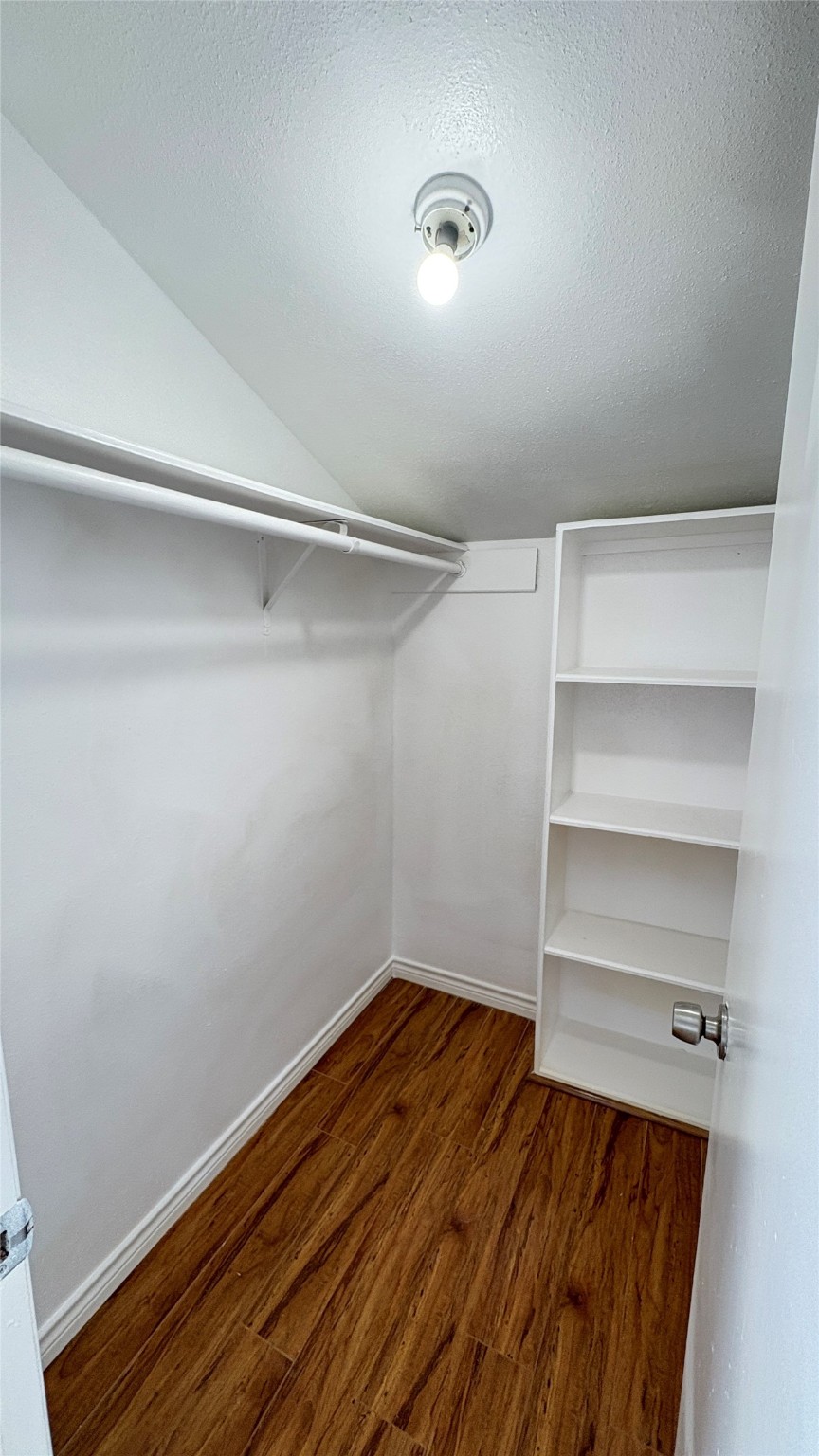6633 West Airport Boulevard, Unit 101 Houston, TX 77035 - Photo 12 of 25 a view of an empty walk in closet