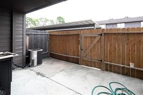 6633 West Airport Boulevard, Unit 101 Houston, TX 77035 - Photo 22 of 25 a backyard of a house