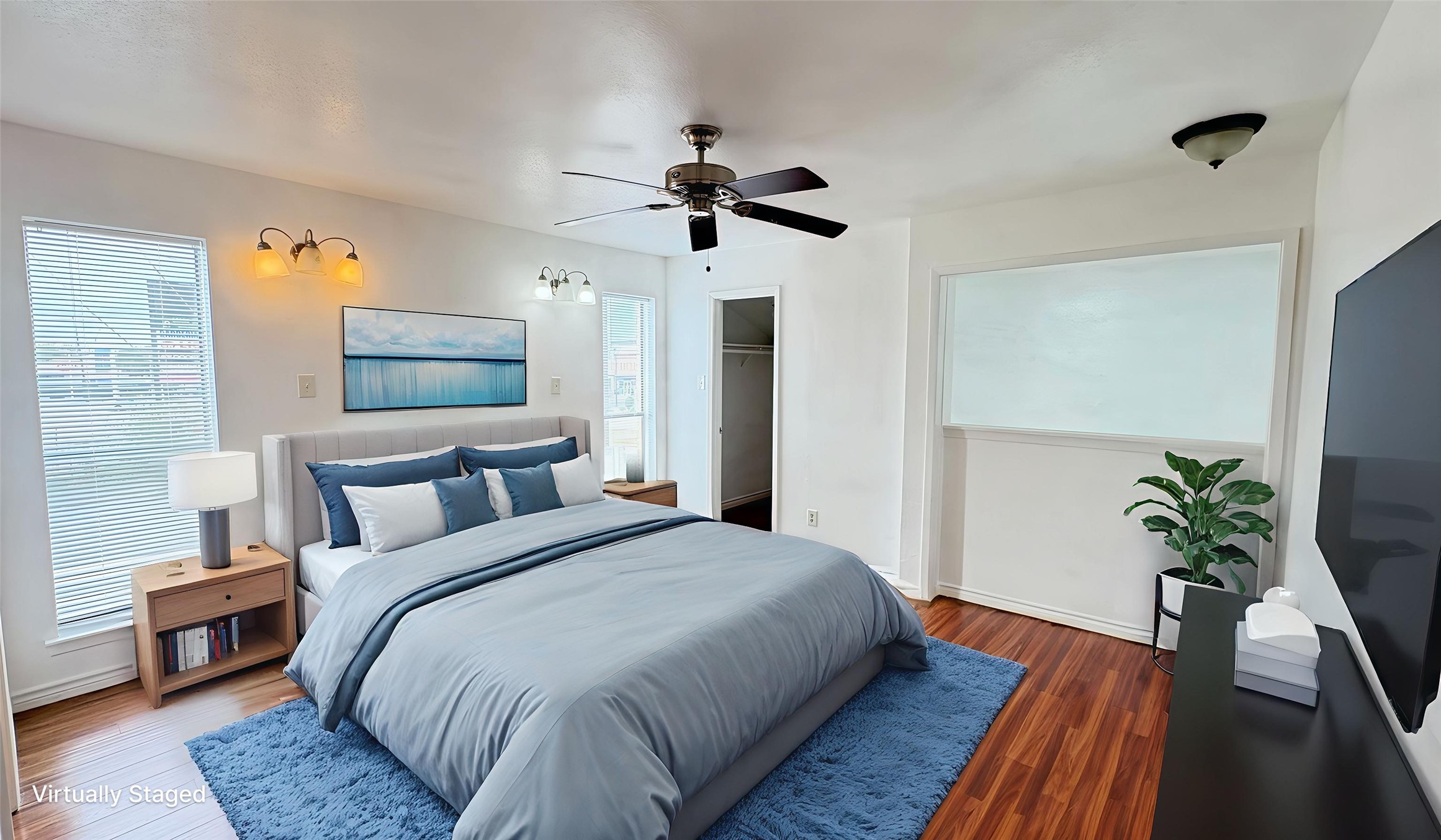 6633 West Airport Boulevard, Unit 101 Houston, TX 77035 - Photo 8 of 25 a bedroom with bed and a potted plant