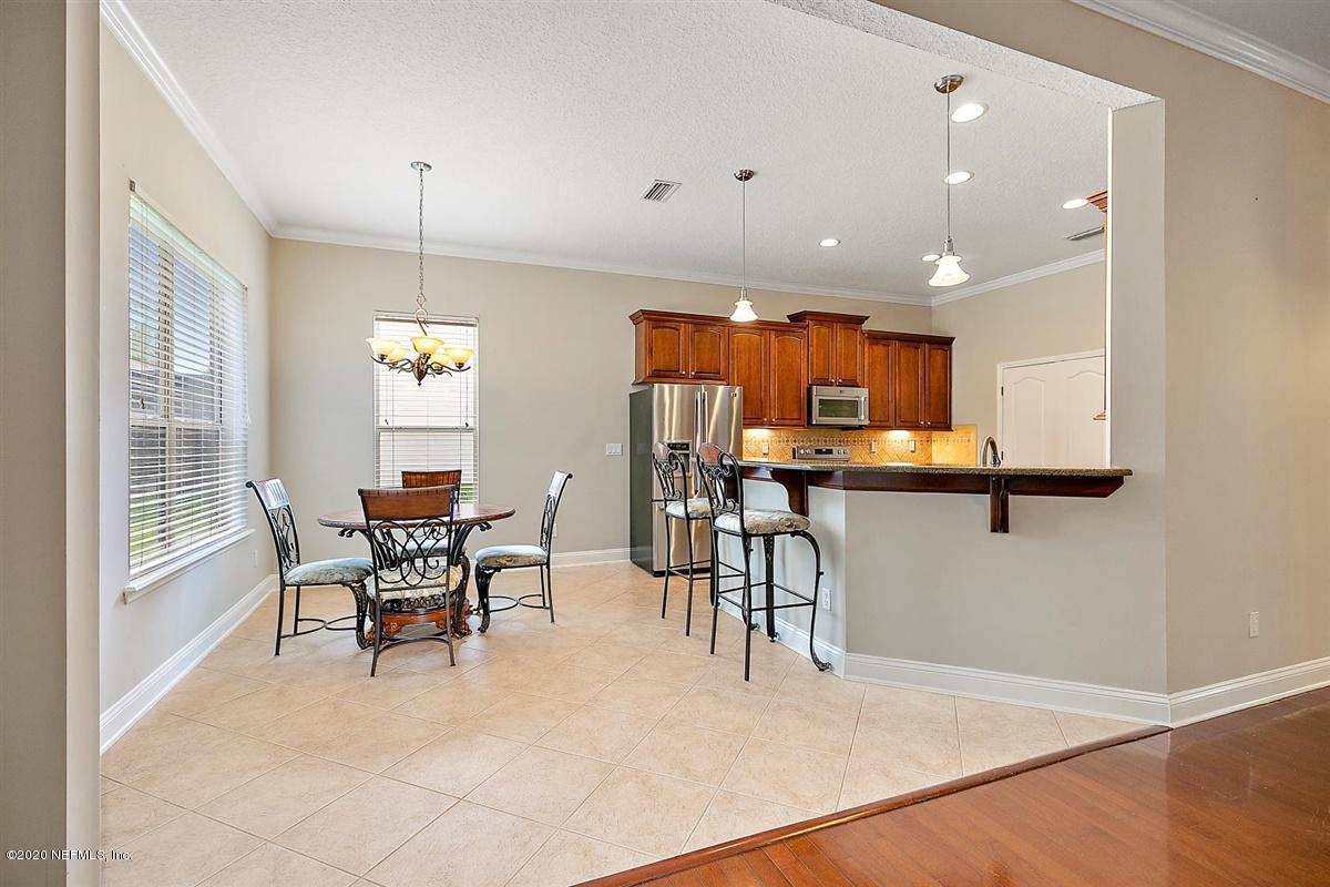 1320 Powis Road St. Augustine, FL 32095 - Photo 12 of 32 a view of a dining room with furniture