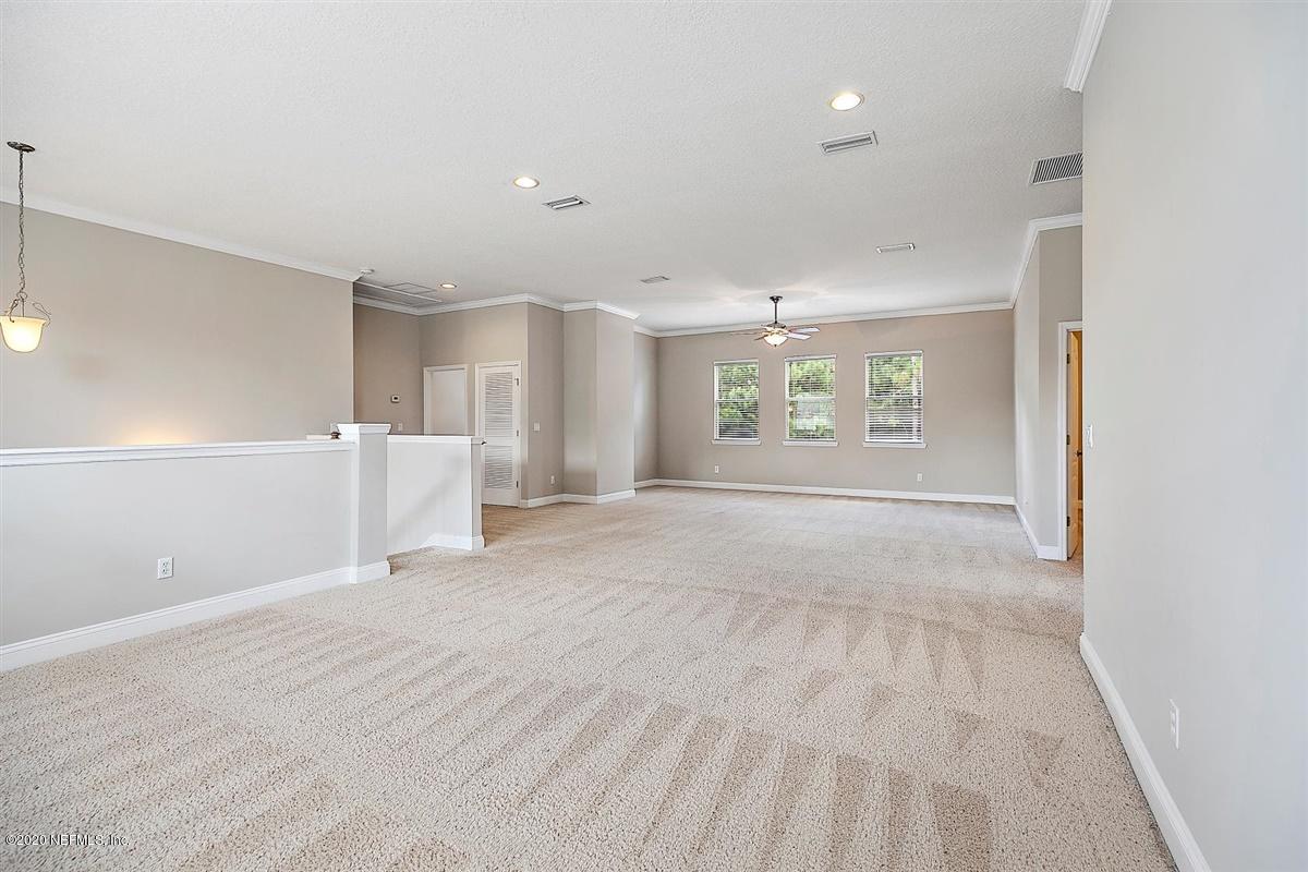 1320 Powis Road St. Augustine, FL 32095 - Photo 18 of 32 a view of an empty room with a window