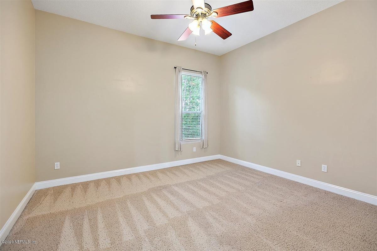 1320 Powis Road St. Augustine, FL 32095 - Photo 20 of 32 a view of an empty room with a window