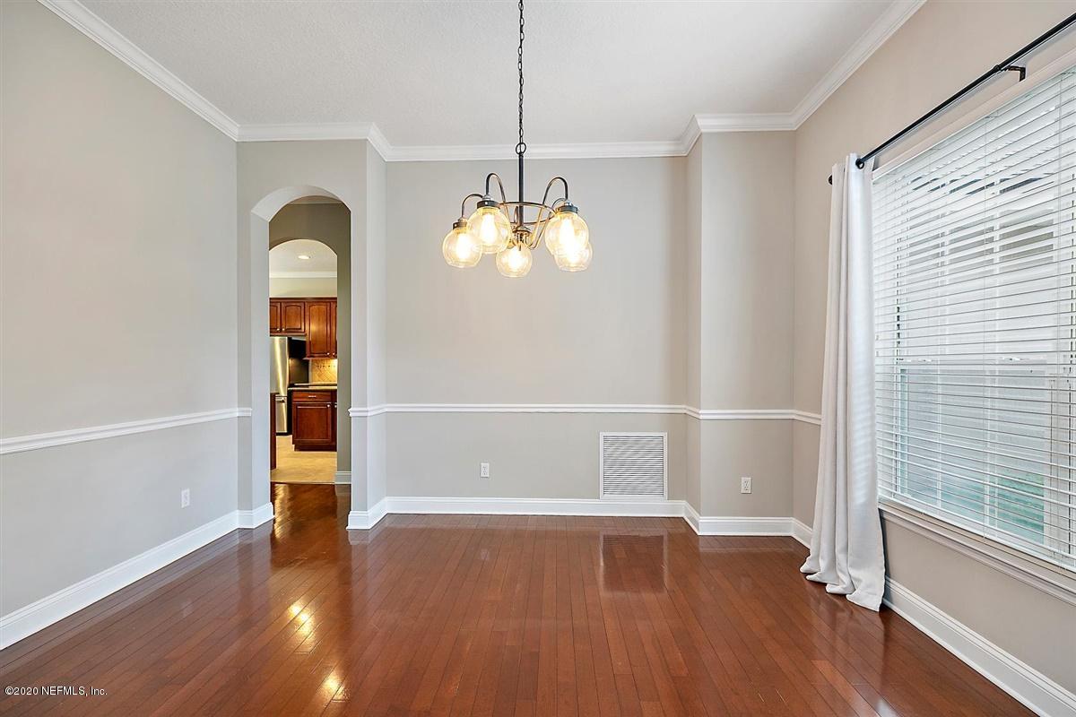 1320 Powis Road St. Augustine, FL 32095 - Photo 6 of 32 a view of livingroom with hardwood floor and window