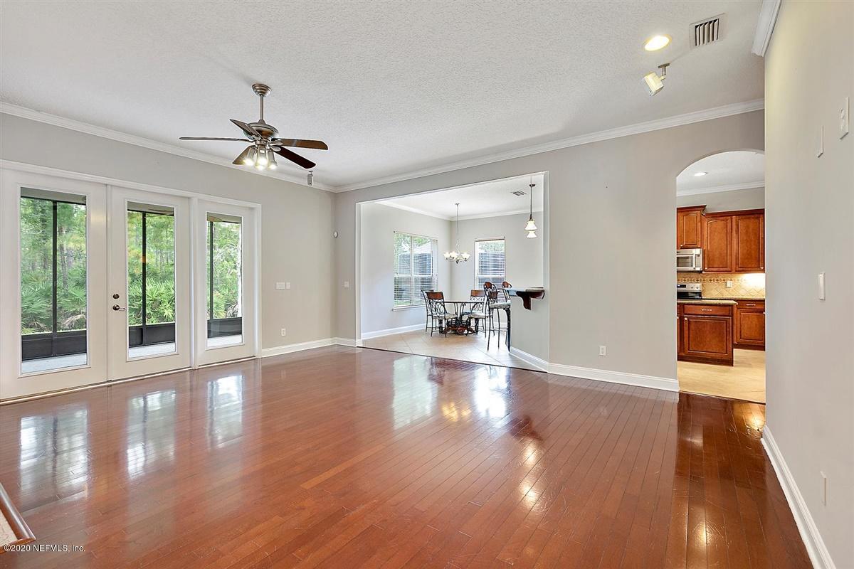 1320 Powis Road St. Augustine, FL 32095 - Photo 7 of 32 a view of a living room and hardwood floor