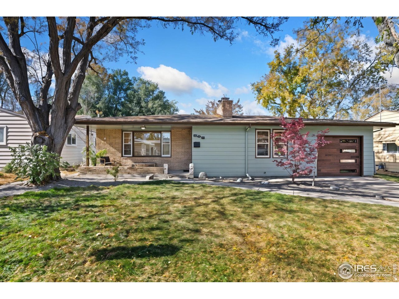 805 Colorado Street Fort Collins, CO 80524 - Photo 1 of 45 a view of a house with pool and chairs