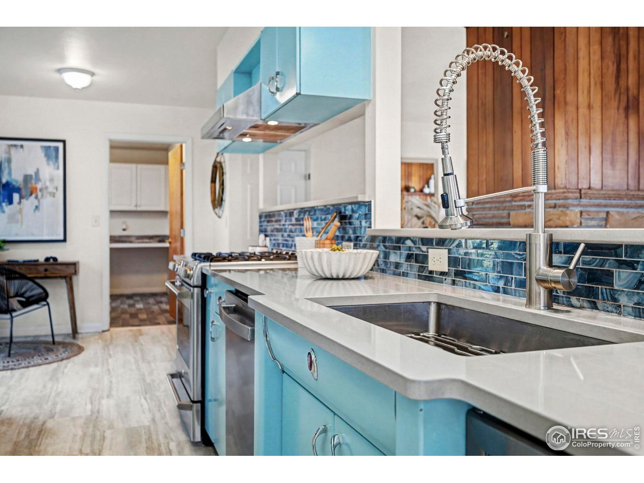805 Colorado Street Fort Collins, CO 80524 - Photo 16 of 45 a kitchen with a sink cabinets and a window