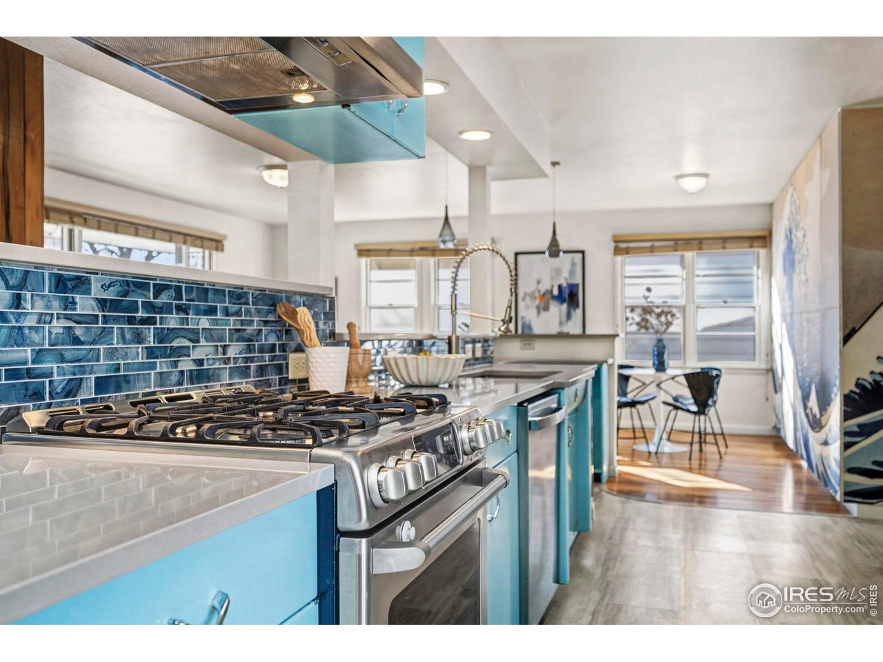 805 Colorado Street Fort Collins, CO 80524 - Photo 18 of 45 a kitchen with a stove and a wooden cabinets