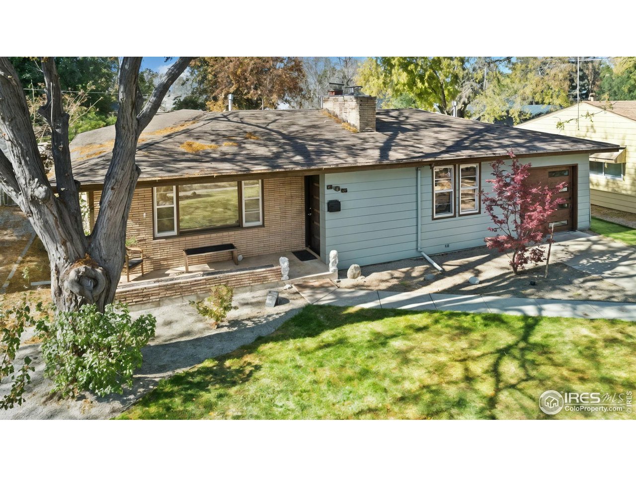 805 Colorado Street Fort Collins, CO 80524 - Photo 2 of 45 a view of a house with swimming pool and sitting area