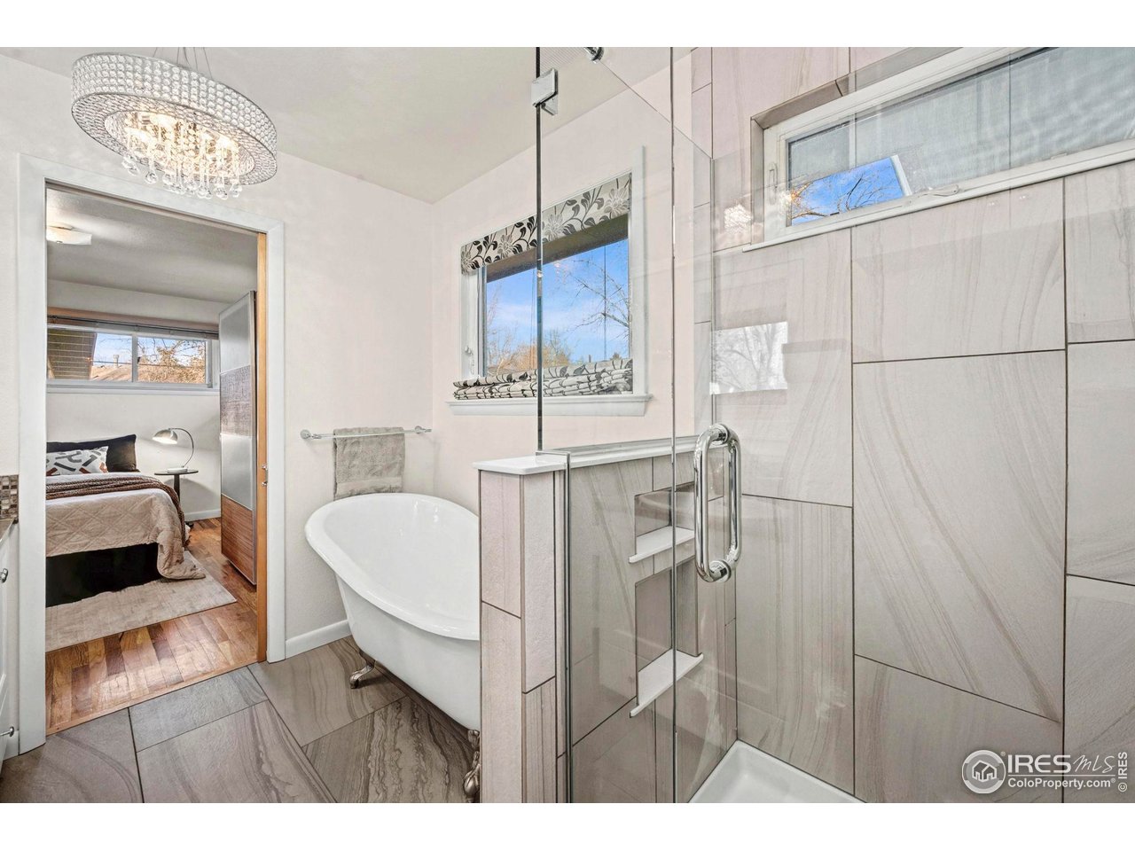 805 Colorado Street Fort Collins, CO 80524 - Photo 35 of 45 a bathroom with a sink and a mirror