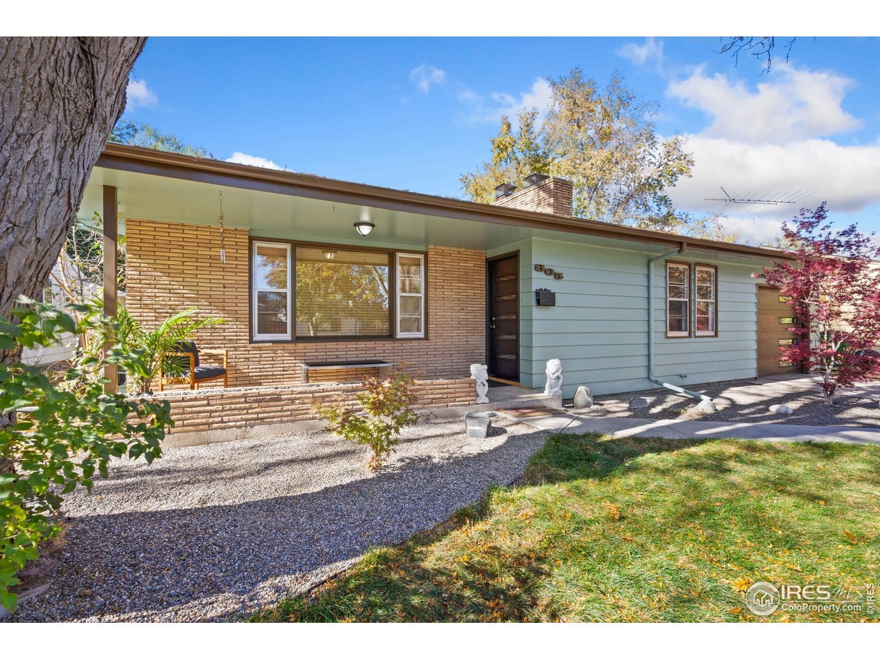805 Colorado Street Fort Collins, CO 80524 - Photo 4 of 45 a front view of a house with garden