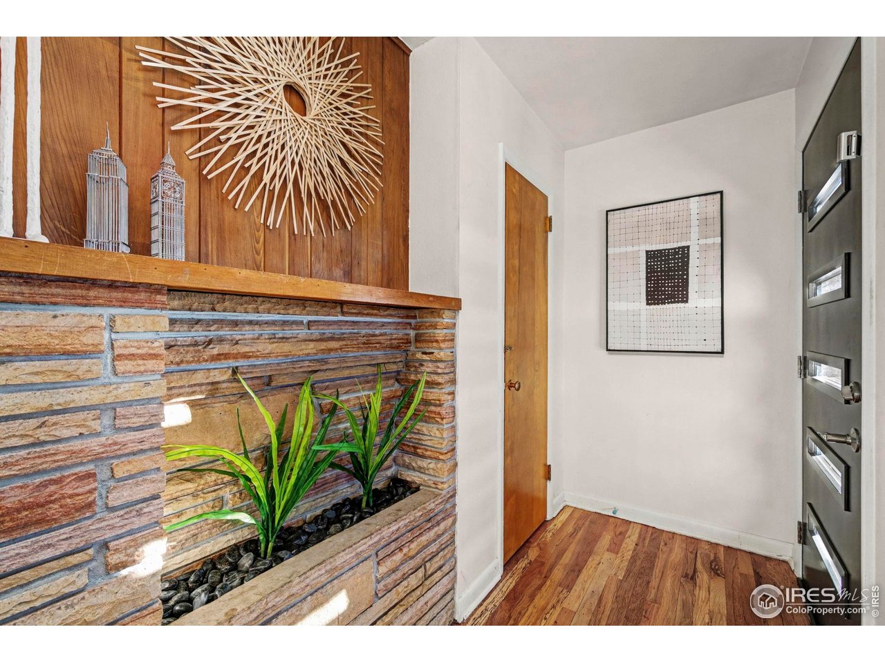 805 Colorado Street Fort Collins, CO 80524 - Photo 5 of 45 a view of entryway with wooden floor