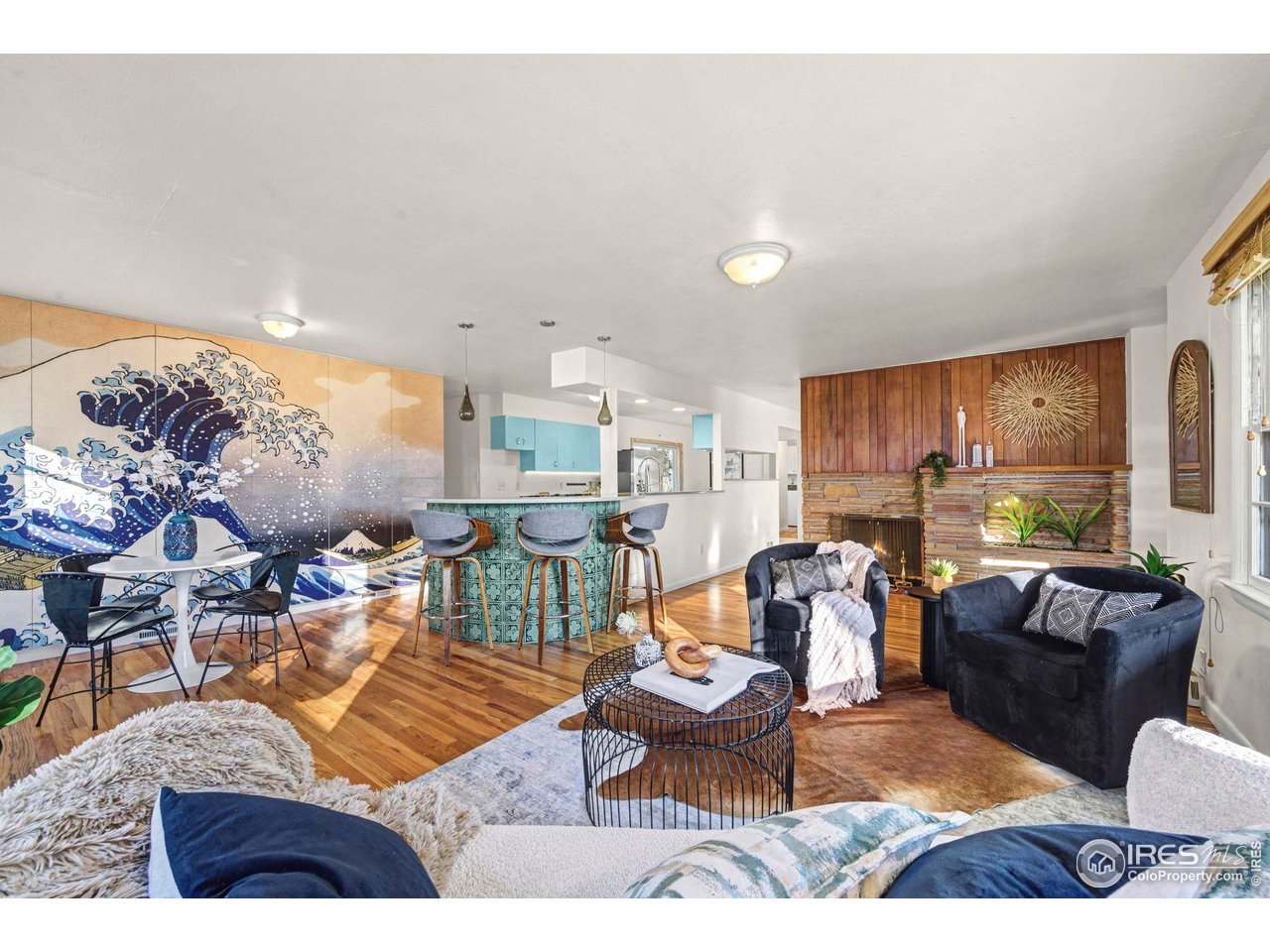 805 Colorado Street Fort Collins, CO 80524 - Photo 9 of 45 a living room with furniture and a large window