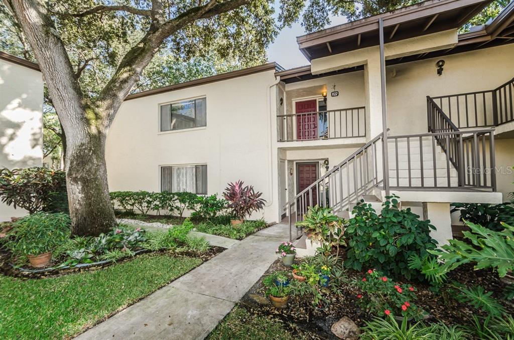 700 Starkey Road, Unit 922 Largo, FL 33771 - Photo 1 of 1 Mature landscaping enhances the courtyard entry at Forestbrook!