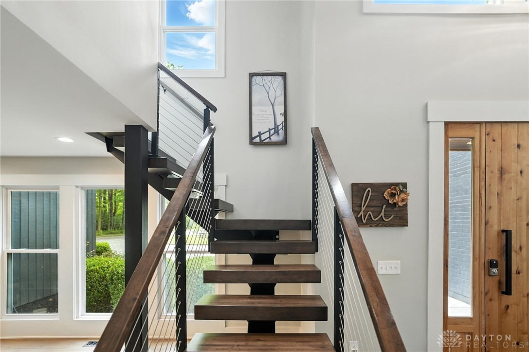 9258 Clyo Road Dayton, OH 45458 - Photo 40 of 68 Modern view rail floating stair system with cable railings.