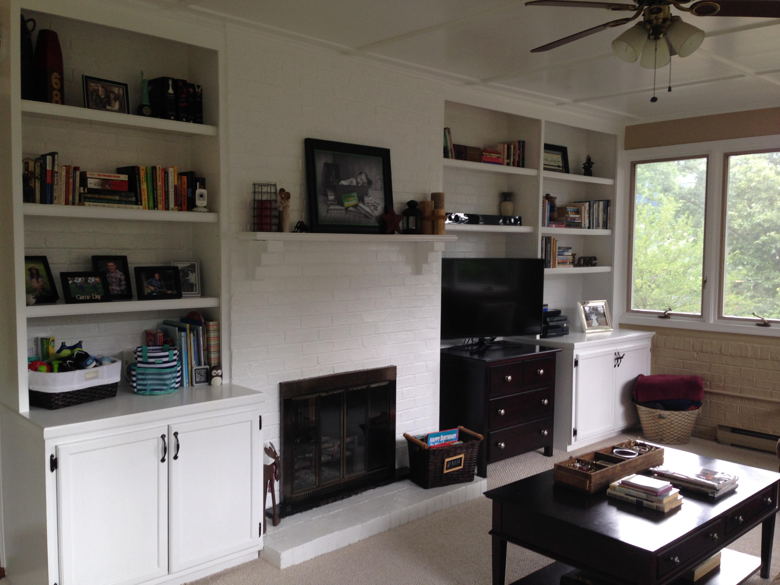 2626 Nottingham Road Southeast Roanoke, VA 24014 - Photo 6 of 33 Shelving and Fireplace in Sunroom