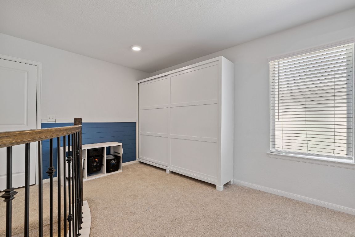 408 Ravello Street Liberty Hill, TX 78642 - Photo 32 of 40 a view of a livingroom with an empty space