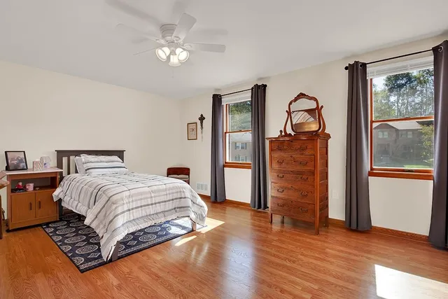 a bath room with a sink and a mirror