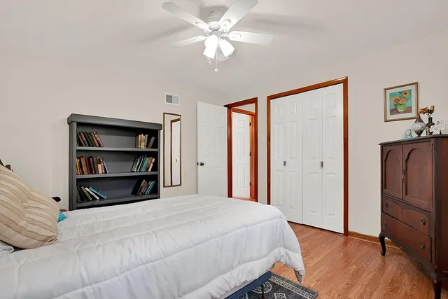 a workspace with furniture hardwood and a window