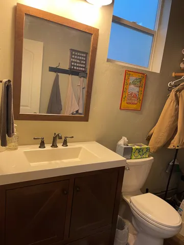 a view of a wooden chairs and table in the house