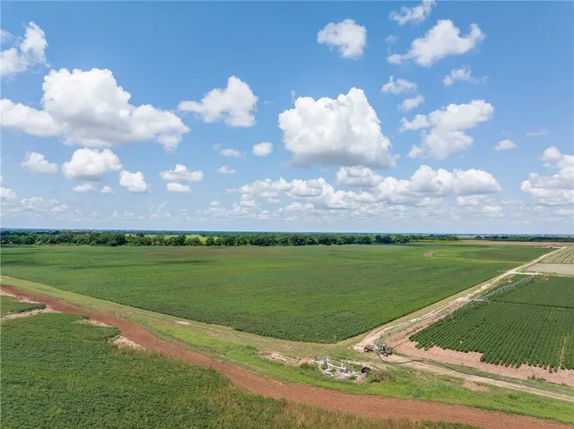 a view of a golf course with a lake