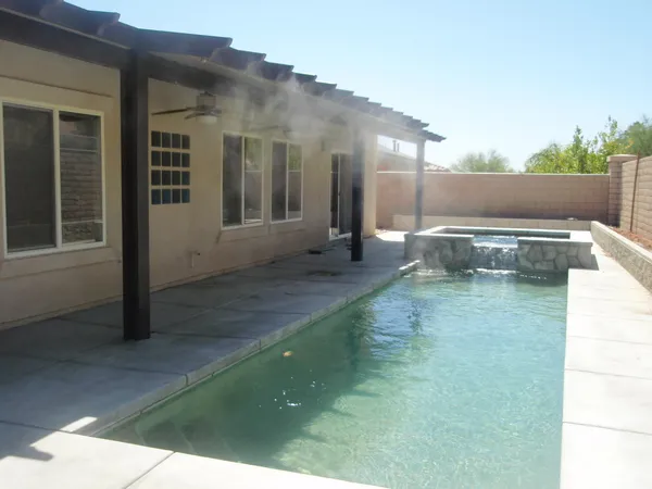 a view of a backyard with plants