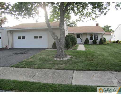 35 Haddon Road Monroe Township, NJ 08831 - Photo 1 of 6 front view of a house with a yard