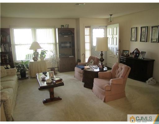 35 Haddon Road Monroe Township, NJ 08831 - Photo 3 of 6 a living room with furniture