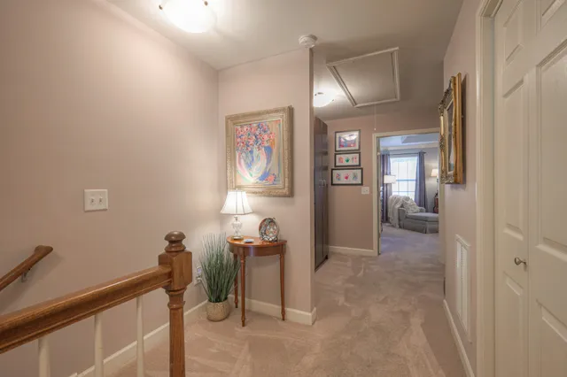 a bed room with bed and a lamp