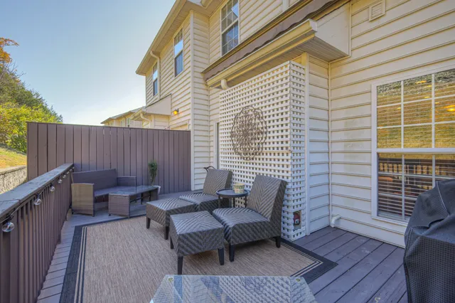 a view of a patio with two chairs