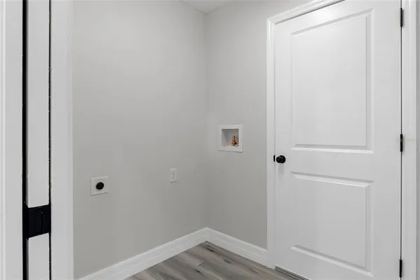 a view of a front door and a window