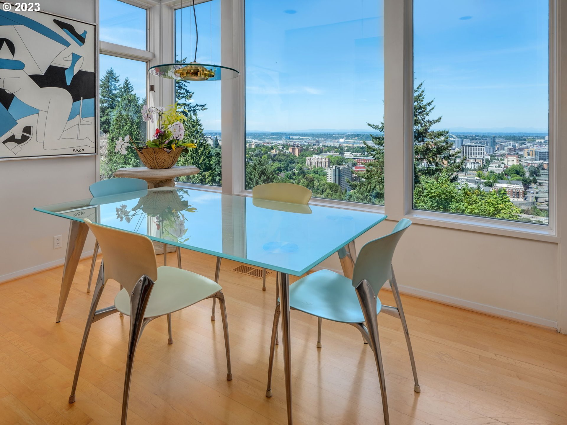 1405 Southwest Cardinell Drive Portland, OR 97201 - Photo 16 of 36 a dining room filled with furniture and window