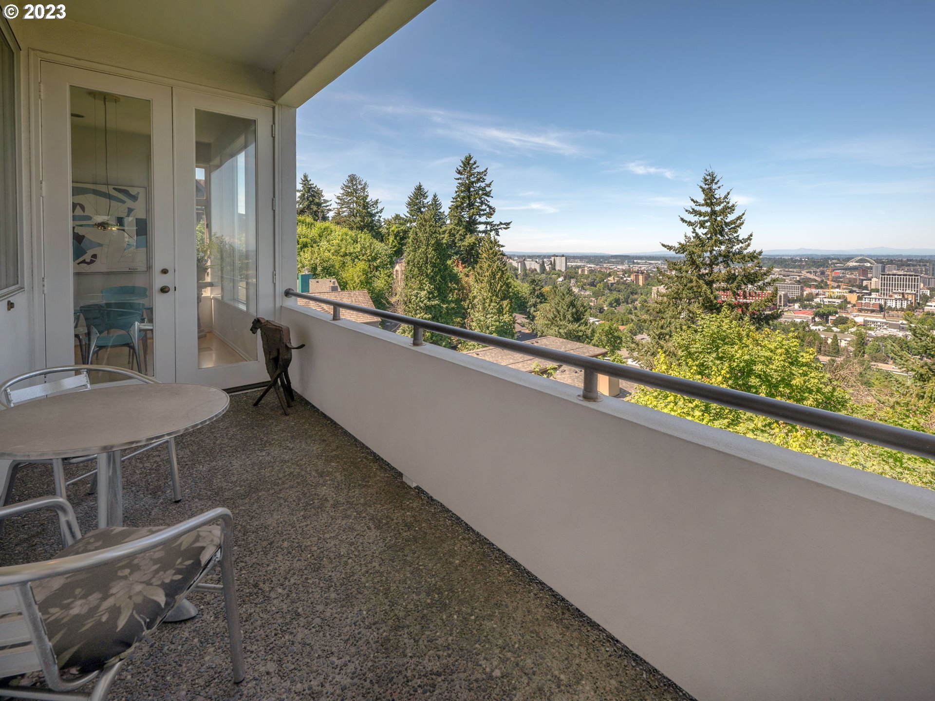 1405 Southwest Cardinell Drive Portland, OR 97201 - Photo 17 of 36 a view of a balcony with an outdoor seating