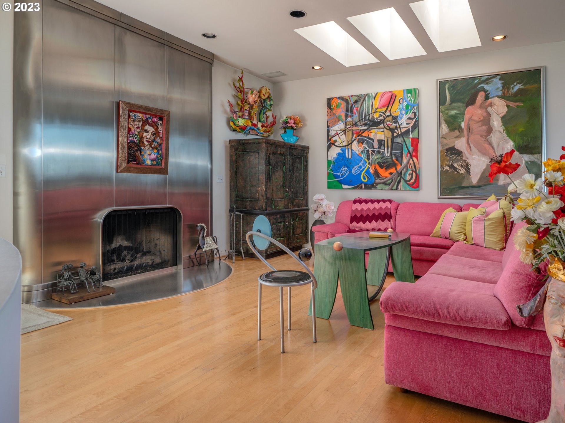 1405 Southwest Cardinell Drive Portland, OR 97201 - Photo 18 of 36 a living room with furniture and a fireplace