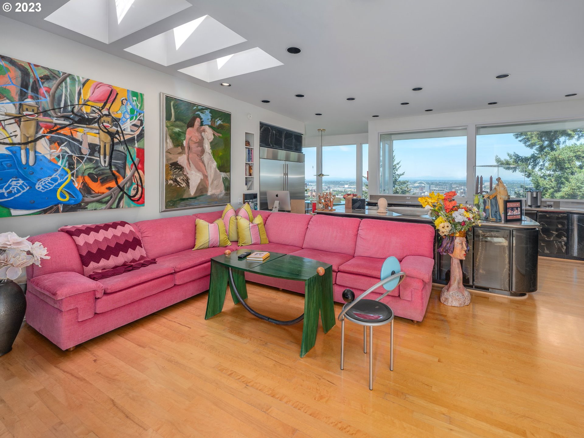 1405 Southwest Cardinell Drive Portland, OR 97201 - Photo 19 of 36 a living room with furniture and a flat screen tv