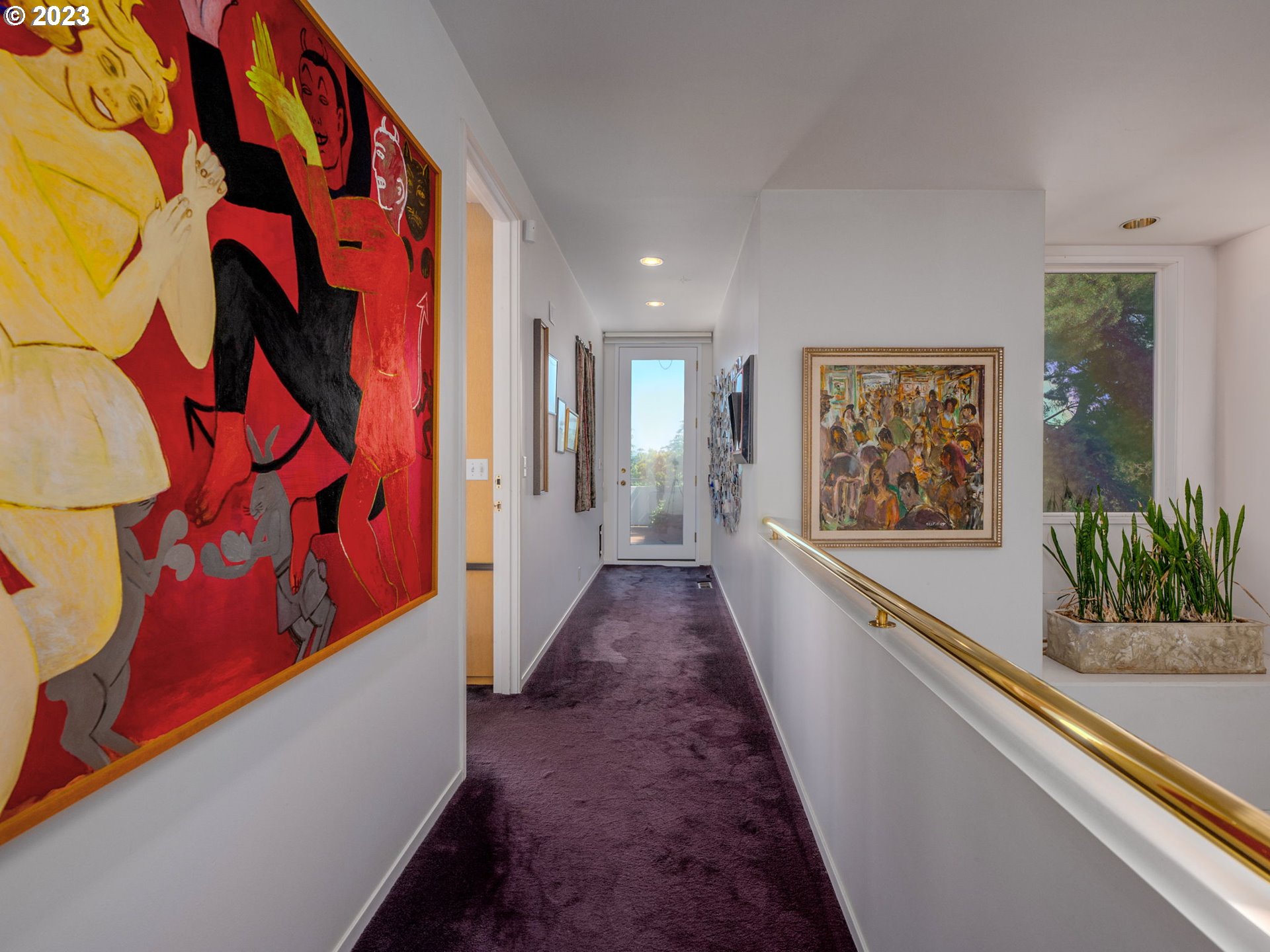 1405 Southwest Cardinell Drive Portland, OR 97201 - Photo 21 of 36 a view of a hallway with wooden floor and stairs