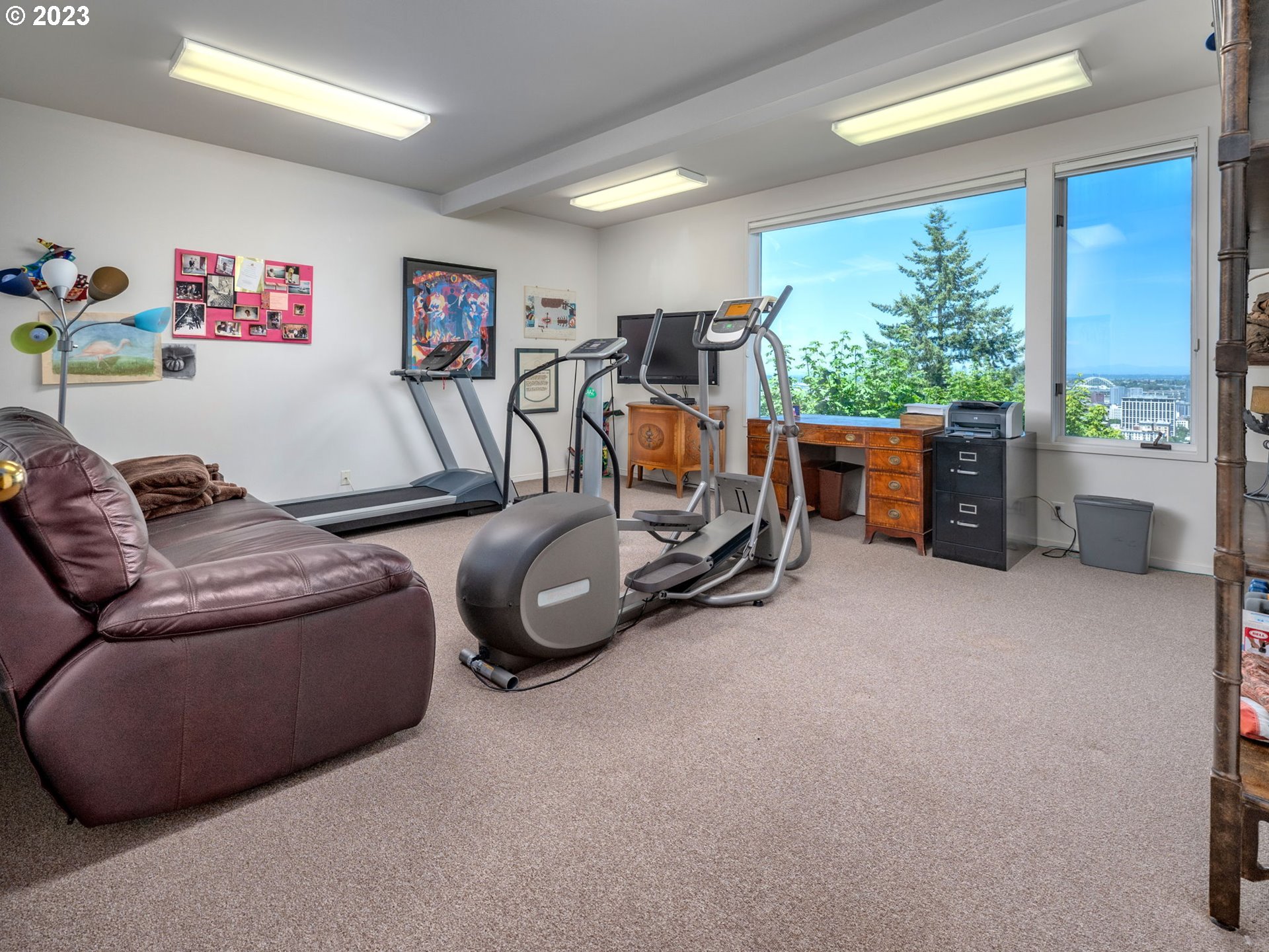 1405 Southwest Cardinell Drive Portland, OR 97201 - Photo 34 of 36 a view of a livingroom with furniture and a large window