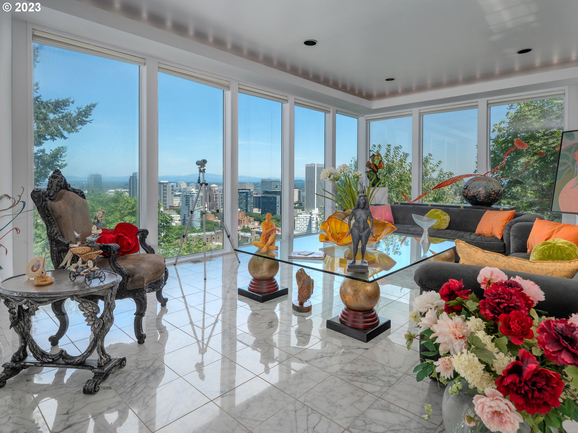 1405 Southwest Cardinell Drive Portland, OR 97201 - Photo 4 of 36 a living room filled with furniture and flowers