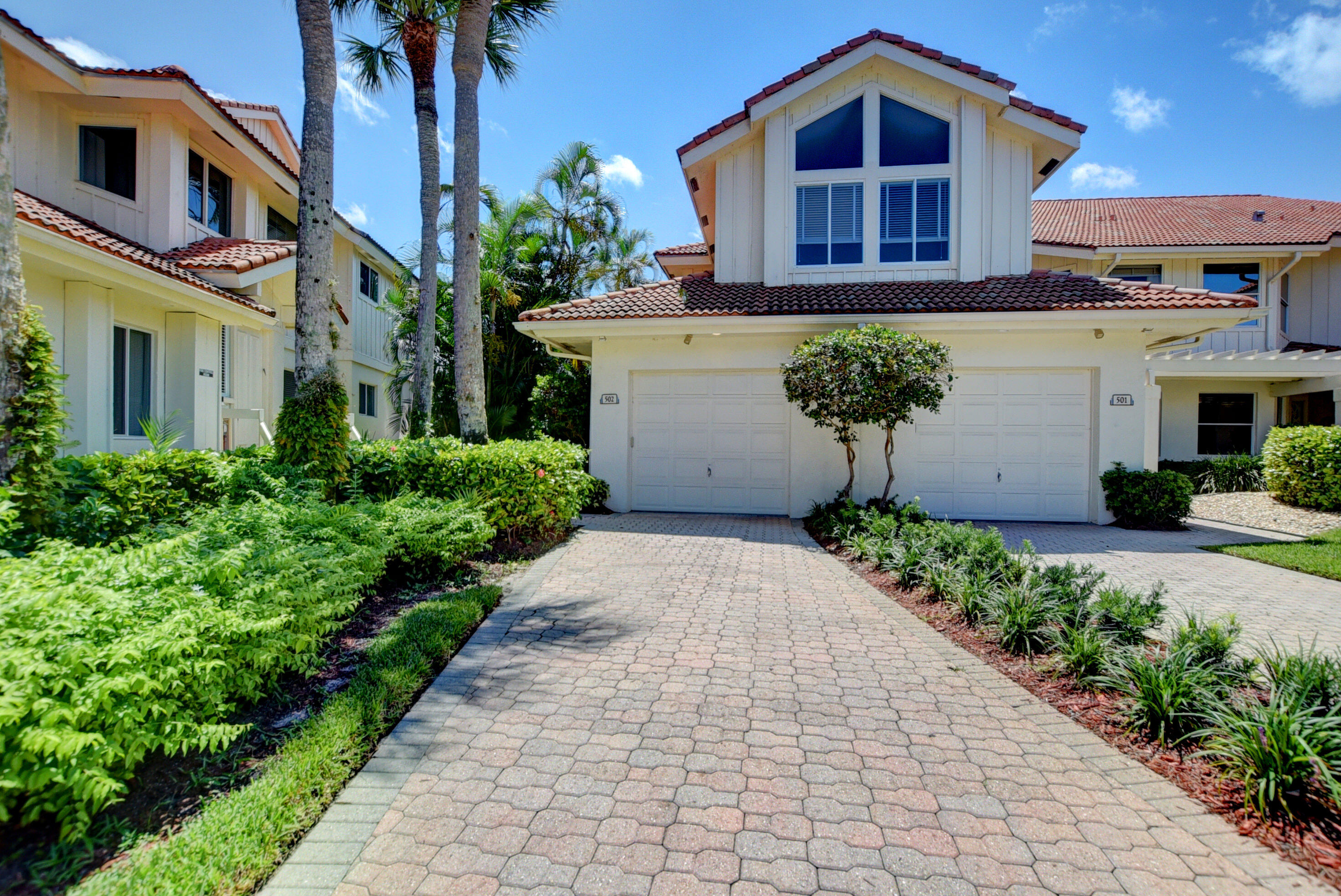 2441 Northwest 59th Street, Unit 502 Boca Raton, FL 33496 - Photo 2 of 46 Front/Driveway