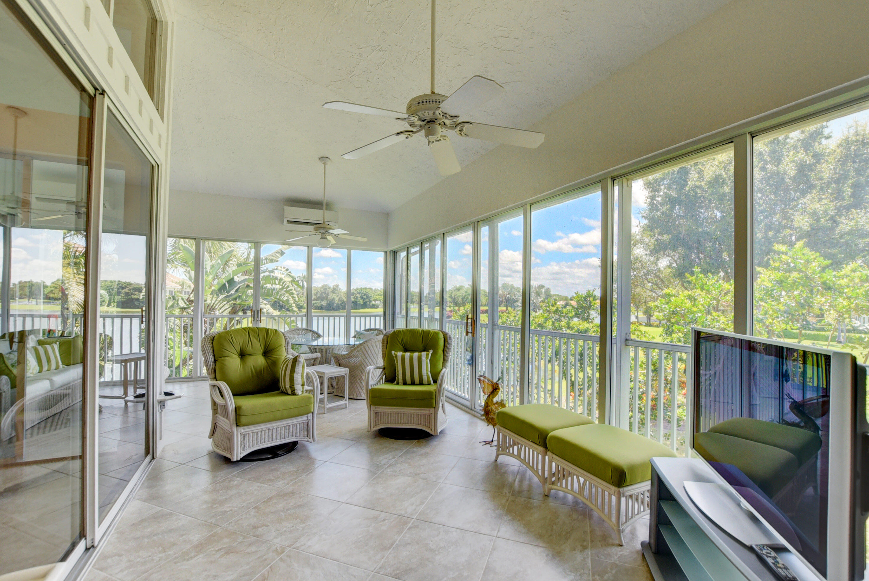 2441 Northwest 59th Street, Unit 502 Boca Raton, FL 33496 - Photo 9 of 46 Glassed/Screened In Porch