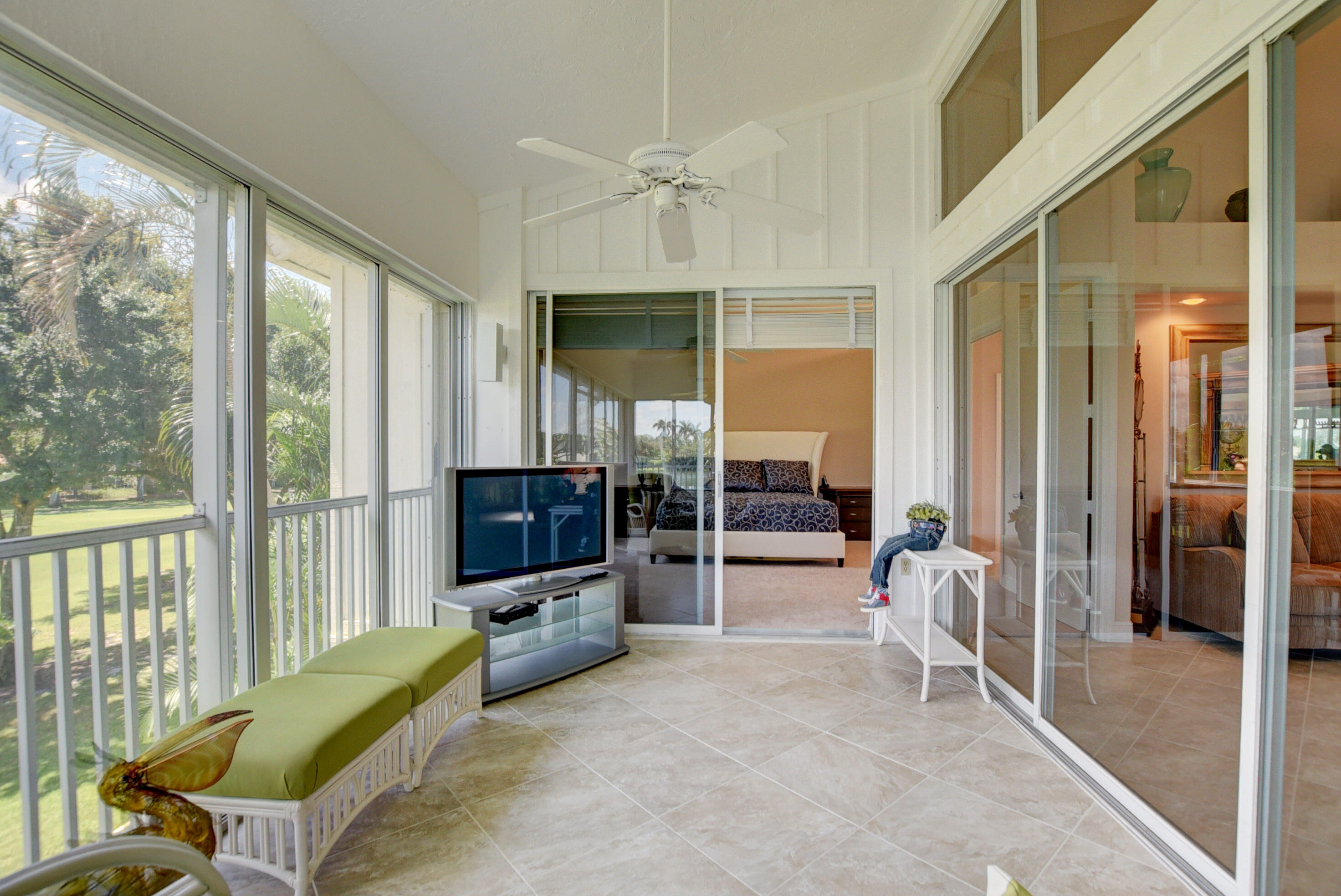 2441 Northwest 59th Street, Unit 502 Boca Raton, FL 33496 - Photo 10 of 46 Glassed/Screened In Porch