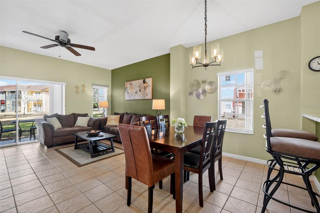 8538 Crystal Cove Loop Kissimmee, FL 34747 - Photo 14 of 59 a view of a dining room with furniture