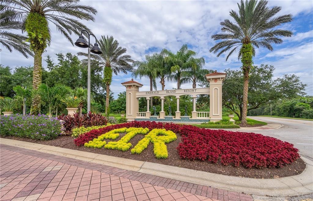 8538 Crystal Cove Loop Kissimmee, FL 34747 - Photo 45 of 59 a view of a backyard with palm trees