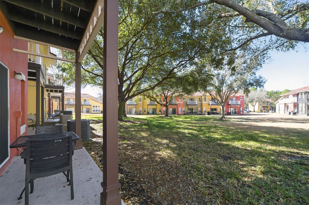 8538 Crystal Cove Loop Kissimmee, FL 34747 - Photo 5 of 59 a view of yard with tree in it