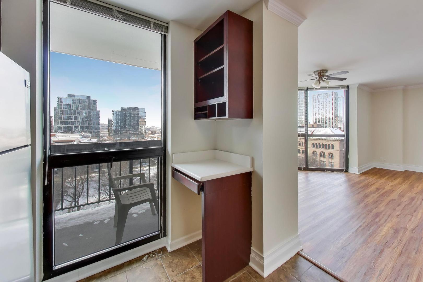 33 West Delaware Place, Unit 12K Chicago, IL 60610 - Photo 14 of 21 a view of a kitchen from the hallway