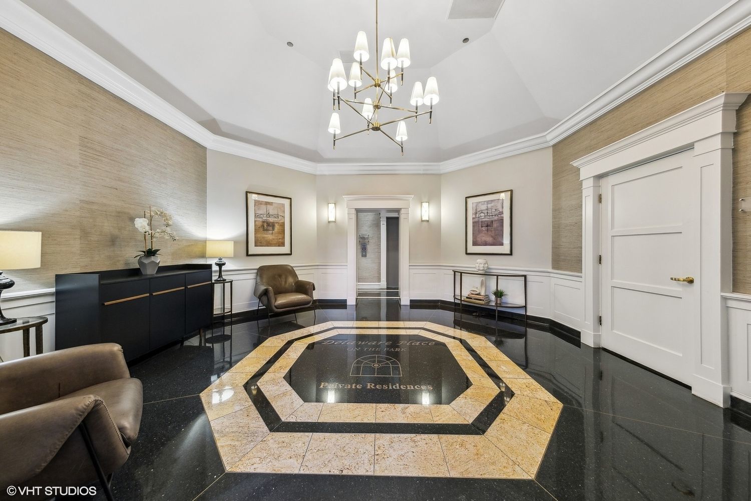 33 West Delaware Place, Unit 12K Chicago, IL 60610 - Photo 4 of 21 a kitchen view with a sink granite counter top a dining table and chairs