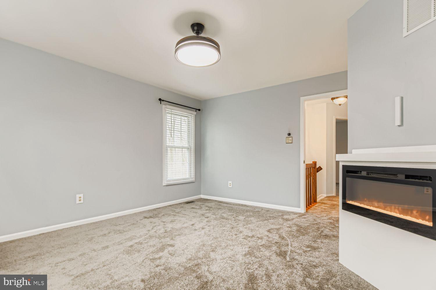 1031 Wingate Court, Unit K 1 Bel Air, MD 21014 - Photo 17 of 29 Large Primary Bedroom with Electric Fireplace