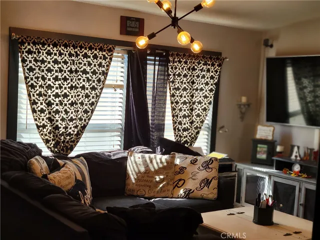 a kitchen with stainless steel appliances granite countertop a refrigerator stove and a sink